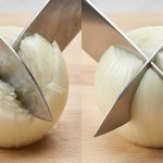 A hyper-realistic studio photograph showing a side-by-side comparison of a dull versus a sharp knife cutting a white onion on a light cutting board. On the left, a dull knife crushes the onion, creating jagged, torn cell layers and a subtle haze. On the right, a gleaming, razor-sharp knife cleanly slices, revealing perfectly smooth, intact cell layers.